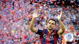 File photo: Barcelona's Xavi Hernandez waves to supporters after their Spanish first division soccer match against Deportivo de la Coruna at Camp Nou stadium in Barcelona, Spain, May 23, 2015. REUTERS/Gustau Nacarino/File Photo(REUTERS) File photo: Barcelona's Xavi Hernandez waves to supporters after their Spanish first division soccer match against Deportivo de la Coruna at Camp Nou stadium in Barcelona, Spain, May 23, 2015. REUTERS/Gustau Nacarino/File Photo(REUTERS)