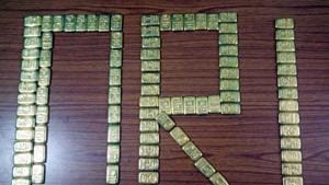 DRI officers seized 30 gold biscuits, weighing about three kilos from the two men who were travelling in a luxury car.(Representative image/HT PHOTO) DRI officers seized 30 gold biscuits, weighing about three kilos from the two men who were travelling in a luxury car.(Representative image/HT PHOTO)