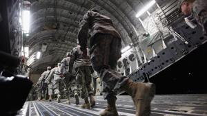 In this file photo, soldiers from the 3rd Brigade, 1st Cavalry Division board a C-17 transport plane to depart from Iraq at Camp Adder, now known as Imam Ali Base, on December 17, 2011 near Nasiriyah, Iraq.(AFP/ FILE) In this file photo, soldiers from the 3rd Brigade, 1st Cavalry Division board a C-17 transport plane to depart from Iraq at Camp Adder, now known as Imam Ali Base, on December 17, 2011 near Nasiriyah, Iraq.(AFP/ FILE)