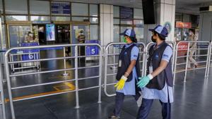 Workers walk outside the departure gate of Sardar Patel International Airport, during the fourth phase of Covid-19 nationwide lockdown, in Ahmedabad on May 24, 2020.(PTI File Photo) Workers walk outside the departure gate of Sardar Patel International Airport, during the fourth phase of Covid-19 nationwide lockdown, in Ahmedabad on May 24, 2020.(PTI File Photo)