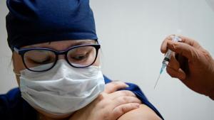 A medic at a regional hospital receives Russia's "Sputnik-V" vaccine shot against the COVID-19 disease in Tver, Russia.(REUTERS) A medic at a regional hospital receives Russia's "Sputnik-V" vaccine shot against the COVID-19 disease in Tver, Russia.(REUTERS)