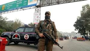 A security personnel stands guard at the encounter site where 4 terrorists were killed by security forces at Nagrota, in Jammu on Thursday.(ANI Photo) A security personnel stands guard at the encounter site where 4 terrorists were killed by security forces at Nagrota, in Jammu on Thursday.(ANI Photo)