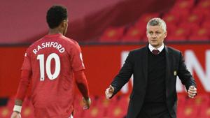 Manchester United manager Ole Gunnar Solskjaer with Marcus Rashford after the match.(Pool via REUTERS) Manchester United manager Ole Gunnar Solskjaer with Marcus Rashford after the match.(Pool via REUTERS)