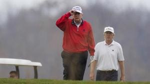President Donald Trump plays golf at Trump National Golf Club in Sterling on November 21.(AP) President Donald Trump plays golf at Trump National Golf Club in Sterling on November 21.(AP)