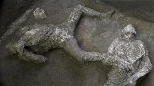 The casts of what are believed to have been a rich man and his male slave fleeing the volcanic eruption of Vesuvius nearly 2,000 years ago, are seen in what was an elegant villa on the outskirts of the ancient Roman city of Pompeii destroyed by the eruption in 79 A.D., where they were discovered during recent excavations, Pompeii archaeological park officials said Saturday, Nov. 21, 2020.(AP) The casts of what are believed to have been a rich man and his male slave fleeing the volcanic eruption of Vesuvius nearly 2,000 years ago, are seen in what was an elegant villa on the outskirts of the ancient Roman city of Pompeii destroyed by the eruption in 79 A.D., where they were discovered during recent excavations, Pompeii archaeological park officials said Saturday, Nov. 21, 2020.(AP)
