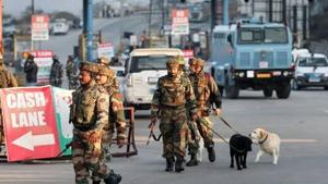 Security officials after the encounter in which four suspected Jaish-e-mohammad terrorists were killed by security forces after they were found hiding in a truck on Srinagar National Highway, near Nagrota, Jammu and Kashmir.(HT photo) Security officials after the encounter in which four suspected Jaish-e-mohammad terrorists were killed by security forces after they were found hiding in a truck on Srinagar National Highway, near Nagrota, Jammu and Kashmir.(HT photo)