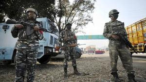 Central Reserve Police Force (CRPF) personnel stand guard at Jammu & Kashmir National Highway after an encounter at Ban Toll Plaza in Nagrota, in Jammu district.(PTI) Central Reserve Police Force (CRPF) personnel stand guard at Jammu & Kashmir National Highway after an encounter at Ban Toll Plaza in Nagrota, in Jammu district.(PTI)