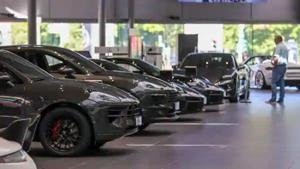 A customer looks at automobiles.(Bloomberg) A customer looks at automobiles.(Bloomberg)