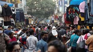 A massive crowd of people shopping while violating social distancing norms after the Covid-19 outbreak, in Sarojini Nagar market in New Delhi on Sunday.(ANI Photo) A massive crowd of people shopping while violating social distancing norms after the Covid-19 outbreak, in Sarojini Nagar market in New Delhi on Sunday.(ANI Photo)