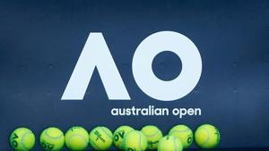 Tennis balls are pictured in front of the Australian Open logo(REUTERS) Tennis balls are pictured in front of the Australian Open logo(REUTERS)
