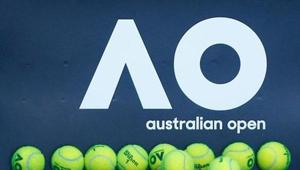 Tennis balls are pictured in front of the Australian Open logo before the tennis tournament.(REUTERS) Tennis balls are pictured in front of the Australian Open logo before the tennis tournament.(REUTERS)