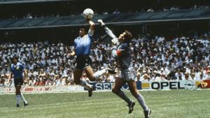 Argentina's Diego Maradona scores 1st goal with his Hand of God, past England goalkeeper Peter Shilton.(Bob Thomas/Getty Images) Argentina's Diego Maradona scores 1st goal with his Hand of God, past England goalkeeper Peter Shilton.(Bob Thomas/Getty Images)