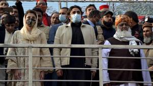 Bilawal Bhutto Zardari, center, at a rally of the Pakistan Democratic Movement, an alliance of opposition parties, in Peshawar, Pakistan, Sunday, Nov. 22, 2020. (AP Photo/Muhammad Sajjad) Bilawal Bhutto Zardari, center, at a rally of the Pakistan Democratic Movement, an alliance of opposition parties, in Peshawar, Pakistan, Sunday, Nov. 22, 2020. (AP Photo/Muhammad Sajjad)
