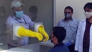 A doctor takes a swab for testing at a portable Covid-19 screening booth, at IIT, Roorkee.(File photo) A doctor takes a swab for testing at a portable Covid-19 screening booth, at IIT, Roorkee.(File photo)