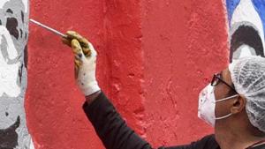 The (anonymous) graffiti that appeared on the wall of an apartment said international terror organisations would be brought to the country if ‘provoked’.(Satyabrata Tripathy/HT Photo for representation) The (anonymous) graffiti that appeared on the wall of an apartment said international terror organisations would be brought to the country if ‘provoked’.(Satyabrata Tripathy/HT Photo for representation)