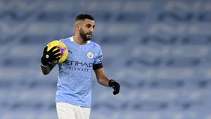 Manchester City's Riyad Mahrez holds the ball at the end of the English Premier League soccer match between Manchester City and Burnley at the Etihad stadium in Manchester.(AP) Manchester City's Riyad Mahrez holds the ball at the end of the English Premier League soccer match between Manchester City and Burnley at the Etihad stadium in Manchester.(AP)