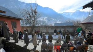 Ganderbal: People wait to cast their votes at a polling booth during the first phase of the District Development Council (DDC) elections in central Kashmir.(PTI) Ganderbal: People wait to cast their votes at a polling booth during the first phase of the District Development Council (DDC) elections in central Kashmir.(PTI)