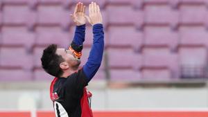FC Barcelona's Lionel Messi celebrates scoring their fourth goal wearing a Newell's Old Boys shirt in reference to former player Diego Maradona.(REUTERS) FC Barcelona's Lionel Messi celebrates scoring their fourth goal wearing a Newell's Old Boys shirt in reference to former player Diego Maradona.(REUTERS)