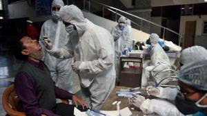 File photo: A healthcare worker takes swab samples of people.(Satish Bate/HT PHOTO) File photo: A healthcare worker takes swab samples of people.(Satish Bate/HT PHOTO)