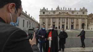 Newly elected Cardinal Enrico Feroci poses for pictures in St.Peter's Square at the Vatican, Sunday, Nov. 29, 2020. Pope Francis raised 13 new cardinals to the highest rank in the Catholic hierarchy Saturday and immediately warned them not to use their titles for corrupt, personal gain, presiding over a ceremony marked from beginning to end by the coronavirus pandemic.(AP) Newly elected Cardinal Enrico Feroci poses for pictures in St.Peter's Square at the Vatican, Sunday, Nov. 29, 2020. Pope Francis raised 13 new cardinals to the highest rank in the Catholic hierarchy Saturday and immediately warned them not to use their titles for corrupt, personal gain, presiding over a ceremony marked from beginning to end by the coronavirus pandemic.(AP)