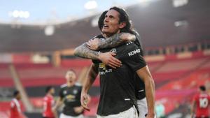 Manchester United's Edinson Cavani celebrates scoring their second goal with Victor Lindelof.(Pool via REUTERS) Manchester United's Edinson Cavani celebrates scoring their second goal with Victor Lindelof.(Pool via REUTERS)