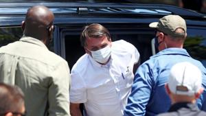 Brazil's President Jair Bolsonaro arrives to vote during the municipal elections in Rio de Janeiro, Brazil, November 29, 2020.(Reuters) Brazil's President Jair Bolsonaro arrives to vote during the municipal elections in Rio de Janeiro, Brazil, November 29, 2020.(Reuters)