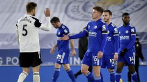 Leicester's Harvey Barnes, front right, shakes hands with Fulham's Joachim Andersen, left, as he leaves the pitch after the English Premier League soccer match between Leicester City and Fulham at the King Power Stadium in Leicester, England, Monday, Nov. 30, 2020. Fulham defeated Leicester by- 2-1.(AP Photo/Rui Vieira, Pool)(AP) Leicester's Harvey Barnes, front right, shakes hands with Fulham's Joachim Andersen, left, as he leaves the pitch after the English Premier League soccer match between Leicester City and Fulham at the King Power Stadium in Leicester, England, Monday, Nov. 30, 2020. Fulham defeated Leicester by- 2-1.(AP Photo/Rui Vieira, Pool)(AP)