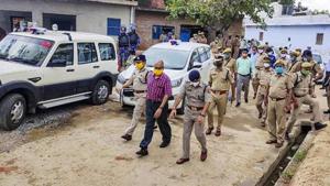 The Special Investigation Team during a visit to Bikru village near Kanpur where eight policemen were killed by gangster Vikas Dubey on July 3.(PTI FILE)