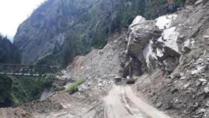 Road widening work underway on a stretch between Joshimath and Badrinath shrine in Chamoli district.(HT file photo ) Road widening work underway on a stretch between Joshimath and Badrinath shrine in Chamoli district.(HT file photo )