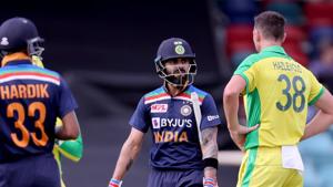India's captain Virat Kohli (C) reacts after his dismissal off Australia's paceman Josh Hazlewood (R) during the third one-day international cricket match between Australia and India at Manuka Oval in Canberra.(AFP) India's captain Virat Kohli (C) reacts after his dismissal off Australia's paceman Josh Hazlewood (R) during the third one-day international cricket match between Australia and India at Manuka Oval in Canberra.(AFP)
