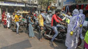 Ahmedabad: People wait in queues for their thermal scanning before entering a market to shop, amidst the spread of the coronavirus, in Ahmedabad, Thursday, Nov. 12, 2020. (PTI Photo) (PTI12-11-2020_000103B) Ahmedabad: People wait in queues for their thermal scanning before entering a market to shop, amidst the spread of the coronavirus, in Ahmedabad, Thursday, Nov. 12, 2020. (PTI Photo) (PTI12-11-2020_000103B)