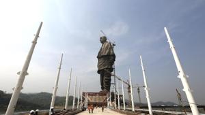 The Statue of Unity stands facing Sardar Sarovar Dam is sen at Kevadiya Colony, about 200 kilometers (125 miles) from Ahmadabad.(AP) The Statue of Unity stands facing Sardar Sarovar Dam is sen at Kevadiya Colony, about 200 kilometers (125 miles) from Ahmadabad.(AP)
