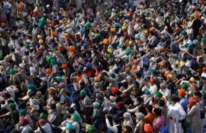 Farmers raising slogans during a protest against the new farm laws at Singhu border near Delhi on Thursday.(Reuters photo) Farmers raising slogans during a protest against the new farm laws at Singhu border near Delhi on Thursday.(Reuters photo)