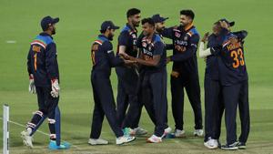 The Indian cricket team celebrates its 13-run win against Australia.(Getty Images) The Indian cricket team celebrates its 13-run win against Australia.(Getty Images)