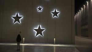 A child look at Christmas decoration at the Stavros Niarchos Foundation Cultural Center, in Athens.(AP) A child look at Christmas decoration at the Stavros Niarchos Foundation Cultural Center, in Athens.(AP)