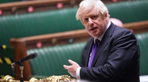 A handout photograph released by the UK Parliament shows Britain's Prime Minister Boris Johnson as he attends the weekly Prime Minister's Questions (PMQs) during a hybrid, socially distanced session at the House of Commons in London on December 2, 2020.(AFP) A handout photograph released by the UK Parliament shows Britain's Prime Minister Boris Johnson as he attends the weekly Prime Minister's Questions (PMQs) during a hybrid, socially distanced session at the House of Commons in London on December 2, 2020.(AFP)