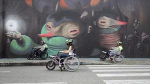 Martin Londoño, left, owner of MATT, an electric wheelchair tour company, rides with some of his clients during a tour in Medellin, Colombia, Wednesday, Nov. 18, 2020. The steering and breaks on the wheelchairs are like those on a regular bicycle, while accelerating only requires pushing a button on one of the handles.(AP) Martin Londoño, left, owner of MATT, an electric wheelchair tour company, rides with some of his clients during a tour in Medellin, Colombia, Wednesday, Nov. 18, 2020. The steering and breaks on the wheelchairs are like those on a regular bicycle, while accelerating only requires pushing a button on one of the handles.(AP)