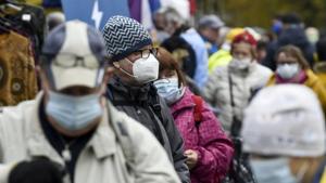 People wear face masks at the Hakaniemi Sunday market amid the coronavirus disease (Covid-19) outbreak in Helsinki, Finland.(Reuters) People wear face masks at the Hakaniemi Sunday market amid the coronavirus disease (Covid-19) outbreak in Helsinki, Finland.(Reuters)