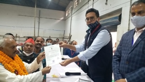 Assistant returning officer Navneet Singh Chahal handing over the certificate of victory to newly elected MLC Lal Bihari Yadav in Varanasi on Friday.(HT PHOTO) Assistant returning officer Navneet Singh Chahal handing over the certificate of victory to newly elected MLC Lal Bihari Yadav in Varanasi on Friday.(HT PHOTO)