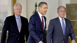 Former President Barack Obama, center, walks out of the Oval Office of the White House with former Presidents Bill Clinton, left, and George W. Bush, right.(AP file photo) Former President Barack Obama, center, walks out of the Oval Office of the White House with former Presidents Bill Clinton, left, and George W. Bush, right.(AP file photo)