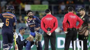 India's Ravindra Jadeja, third left, has a trainer tend to his leg during a break in batting against Australia during their T20 international cricket match at Manuka Oval, in Canberra, Australia, Friday, Dec 4, 2020. (AP Photo/Mark Baker)(AP) India's Ravindra Jadeja, third left, has a trainer tend to his leg during a break in batting against Australia during their T20 international cricket match at Manuka Oval, in Canberra, Australia, Friday, Dec 4, 2020. (AP Photo/Mark Baker)(AP)