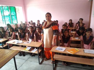 A teacher with her students in the classroom at a government primary school in Prayagraj. (HT File Photo) A teacher with her students in the classroom at a government primary school in Prayagraj. (HT File Photo)