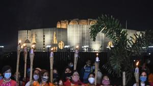 Activists read a manifesto in front of the Parliament House of Bangladesh during a recent protest, in Dhaka.(AFP/ FILE) Activists read a manifesto in front of the Parliament House of Bangladesh during a recent protest, in Dhaka.(AFP/ FILE)