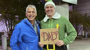 Doug Henning, right, who was adopted as a baby, poses with his biological father after meeting face to face for the first time on Tuesday.(AP) Doug Henning, right, who was adopted as a baby, poses with his biological father after meeting face to face for the first time on Tuesday.(AP)