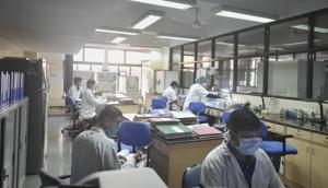 Scientists at work at a Covaxin trial site of ICMR-NICED during phase-III regulatory trial of the Covid-19 vaccine candidate, in Kolkata.(PTI) Scientists at work at a Covaxin trial site of ICMR-NICED during phase-III regulatory trial of the Covid-19 vaccine candidate, in Kolkata.(PTI)