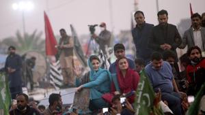 Multan: Maryam Nawaz Sharif, center, in blue dress, a leader of the Pakistan Democratic Movement, an alliance of opposition parties, waves to her supporter during an anti-government rally, in Multan, Pakistan.(AP) Multan: Maryam Nawaz Sharif, center, in blue dress, a leader of the Pakistan Democratic Movement, an alliance of opposition parties, waves to her supporter during an anti-government rally, in Multan, Pakistan.(AP)