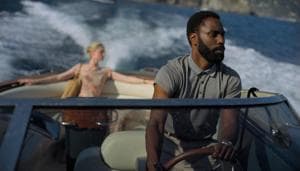 This image released by Warner Bros. Entertainment shows Elizabeth Debicki, left, and John David Washington in a scene from Tenet.(AP)