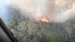 An aerial view shows bushfires on Fraser Island, Queensland, Australia, in this still image taken from video released on December 2, 2020.(Reuters) An aerial view shows bushfires on Fraser Island, Queensland, Australia, in this still image taken from video released on December 2, 2020.(Reuters)