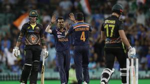 India's T Natarajan, second right, celebrates with teammate Yuzvendra Chahal after dismissing Australia's Moises Henriques, left, during the second T20 international cricket match between Australia and India at the Sydney Cricket Ground in Sydney, Australia, Sunday, Dec. 6, 2020.(AP) India's T Natarajan, second right, celebrates with teammate Yuzvendra Chahal after dismissing Australia's Moises Henriques, left, during the second T20 international cricket match between Australia and India at the Sydney Cricket Ground in Sydney, Australia, Sunday, Dec. 6, 2020.(AP)