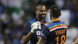 India's captain Virat Kohli, right, congratulates teammate Hardik Pandya after their win in the second T20 international cricket match between Australia and India at the Sydney Cricket Ground in Sydney.(AP) India's captain Virat Kohli, right, congratulates teammate Hardik Pandya after their win in the second T20 international cricket match between Australia and India at the Sydney Cricket Ground in Sydney.(AP)